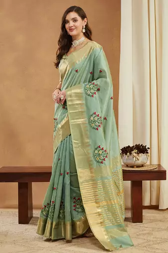 green assam cotton silk saree with embroidery and emple border 