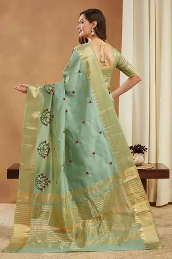green assam cotton silk saree with embroidery and emple border 