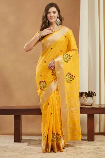 yellow assam cotton silk saree with embroidery and emple border 