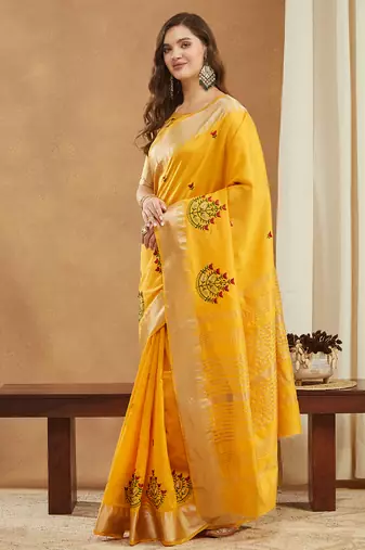 yellow assam cotton silk saree with embroidery and emple border 