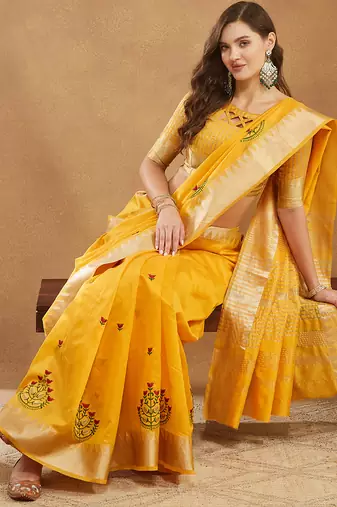 yellow assam cotton silk saree with embroidery and emple border 