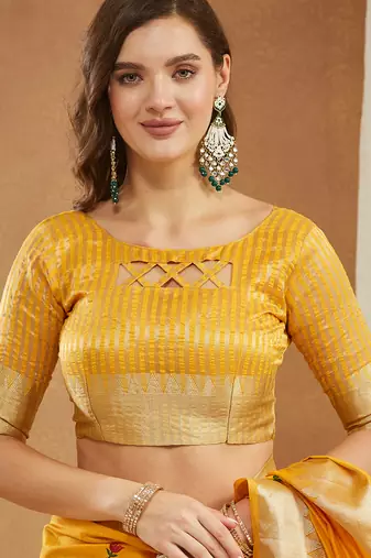 yellow assam cotton silk saree with embroidery and emple border 