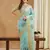 aqua blue assam cotton silk saree with embroidery and emple border 