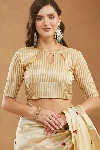 cream assam cotton silk saree with embroidery and emple border 
