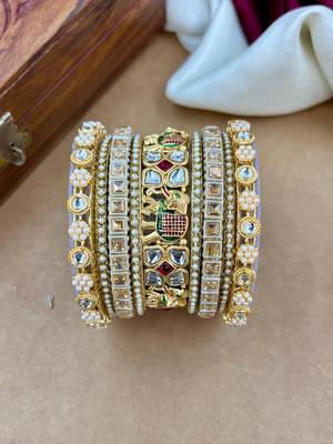 heritage-inspired gold bangles set for special occasions 4
