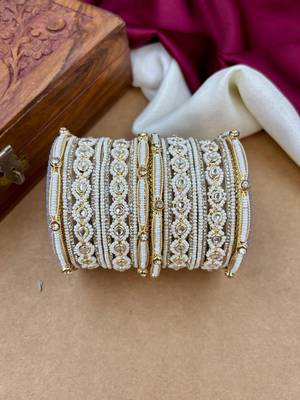 graceful pearl kundan bangles set for festive wear 4