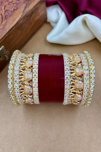 bridal punjabi chura with classic temple detailing