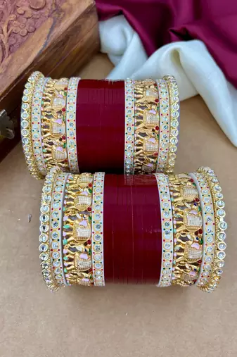 bridal punjabi chura with classic temple detailing