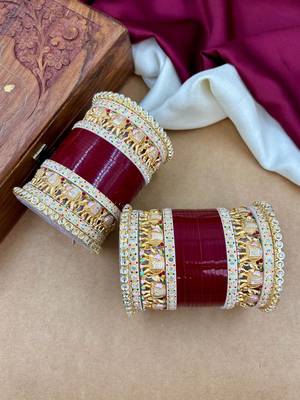 bridal punjabi chura with classic temple detailing 4