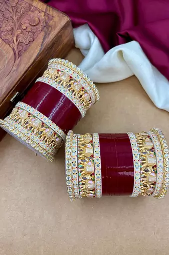 bridal punjabi chura with classic temple detailing