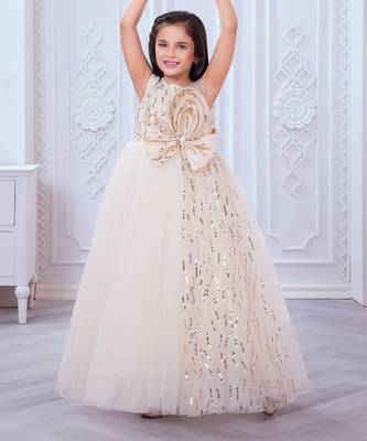 cream net gown with sequins and oversized bow 1