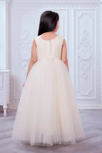 cream net gown with sequins and oversized bow