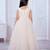 cream net gown with sequins and oversized bow