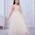 cream net gown with sequins and oversized bow