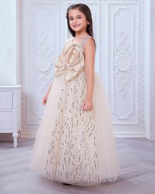 cream net gown with sequins and oversized bow 4