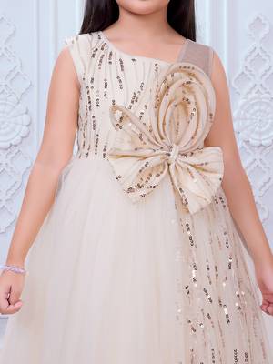 cream net gown with sequins and oversized bow 5