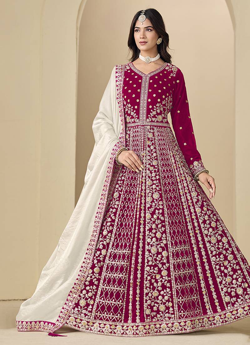 rani pink velvet salwar kameez with embroidered work