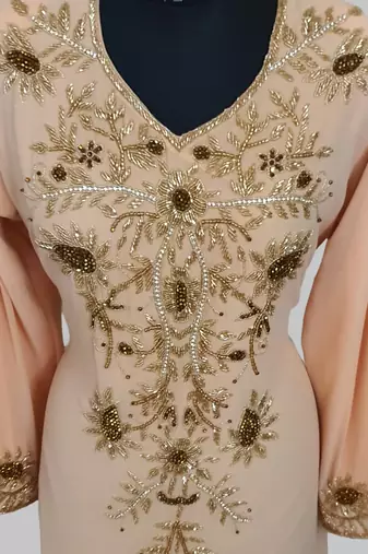 Elegant beige georgette kaftan gown with golden zari work With hijab.