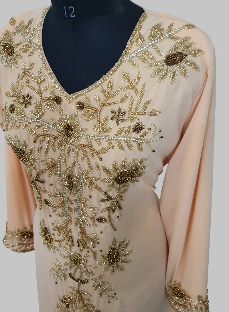 Elegant beige georgette kaftan gown with golden zari work With hijab.