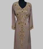 Elegant Chiku georgette kaftan gown with golden zari work With hijab.