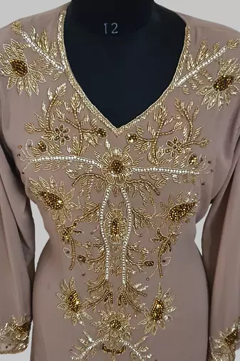 Elegant Chiku georgette kaftan gown with golden zari work With hijab.