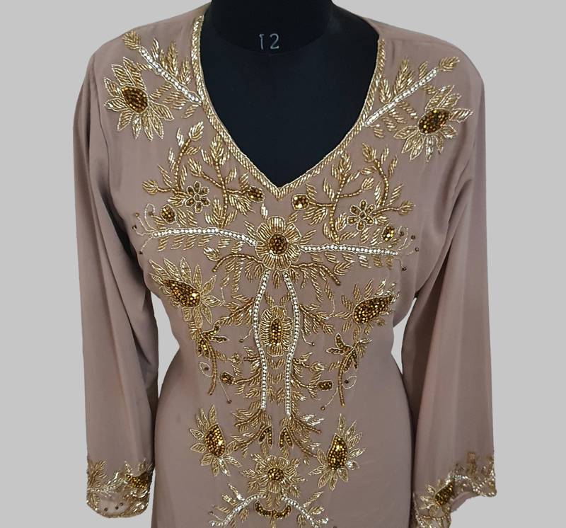 Elegant Chiku georgette kaftan gown with golden zari work With hijab.