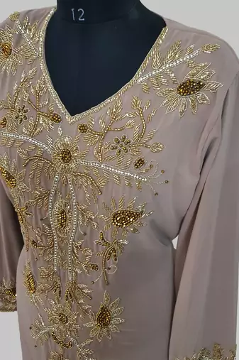 Elegant Chiku georgette kaftan gown with golden zari work With hijab.