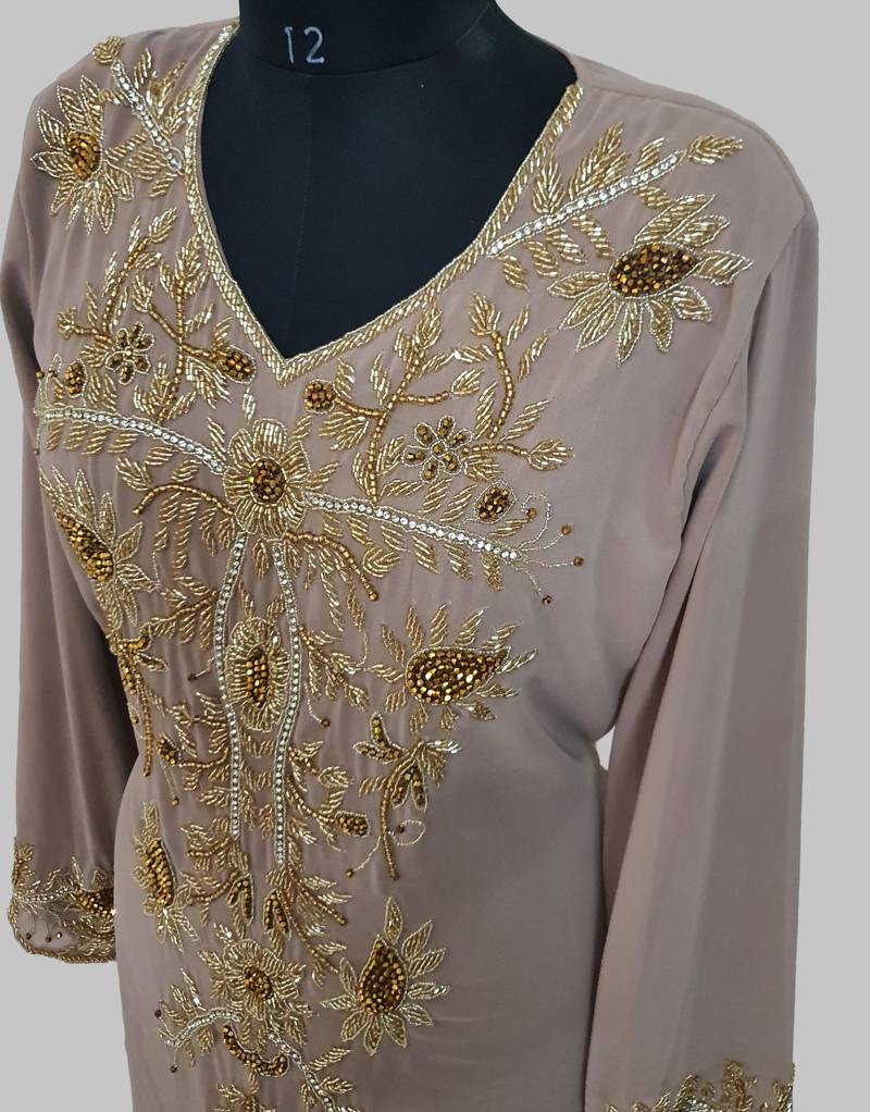 Elegant Chiku georgette kaftan gown with golden zari work With hijab.