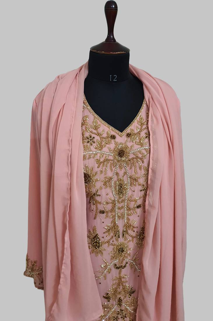 Elegant Peach georgette kaftan gown with golden zari work With hijab.