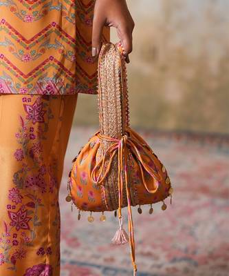 yellow silk embroidered potli bag for weddings 1