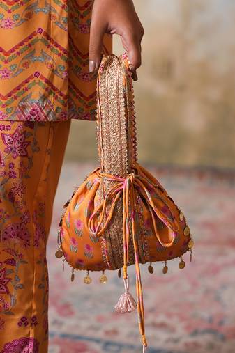 yellow silk embroidered potli bag for weddings