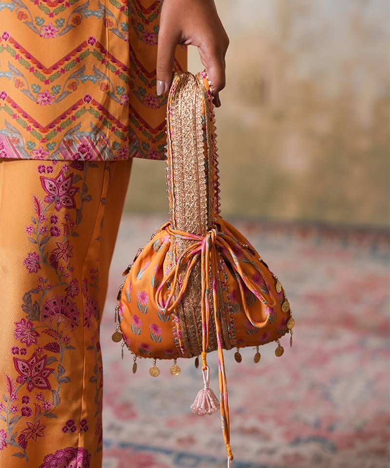 yellow silk embroidered potli bag for weddings