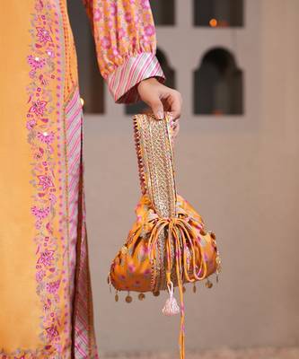 yellow silk embroidered potli bag for weddings 3