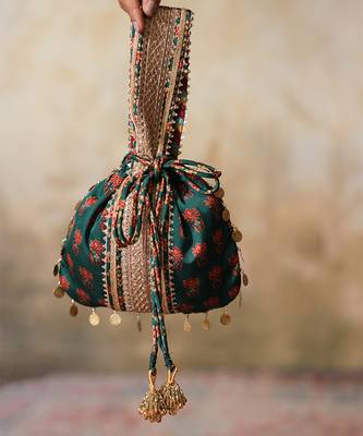 Green silk embroidered potli bag 1