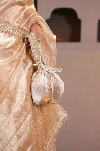 Ivory silk embroidered potli bag