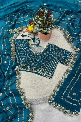 teal satin silk saree with embroidered blouse