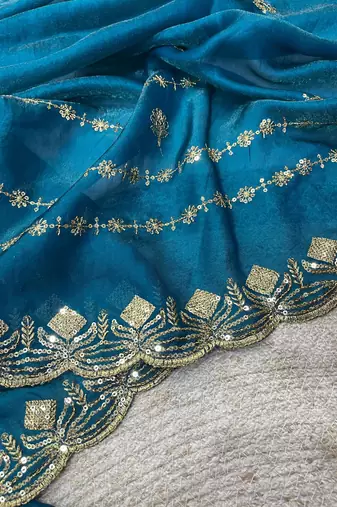 teal satin silk saree with embroidered blouse