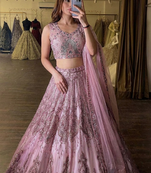 Rose embellished soft net lehenga choli with Dupatta
