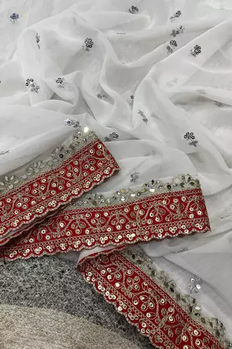 white georgette bridal saree with red embroidered blouse