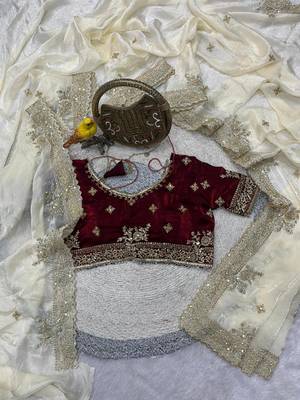 white satin designer saree with maroon embroidered blouse 1