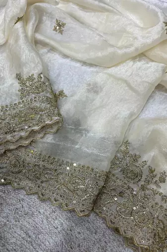 white satin designer saree with maroon embroidered blouse