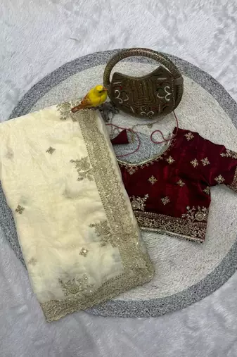 white satin designer saree with maroon embroidered blouse