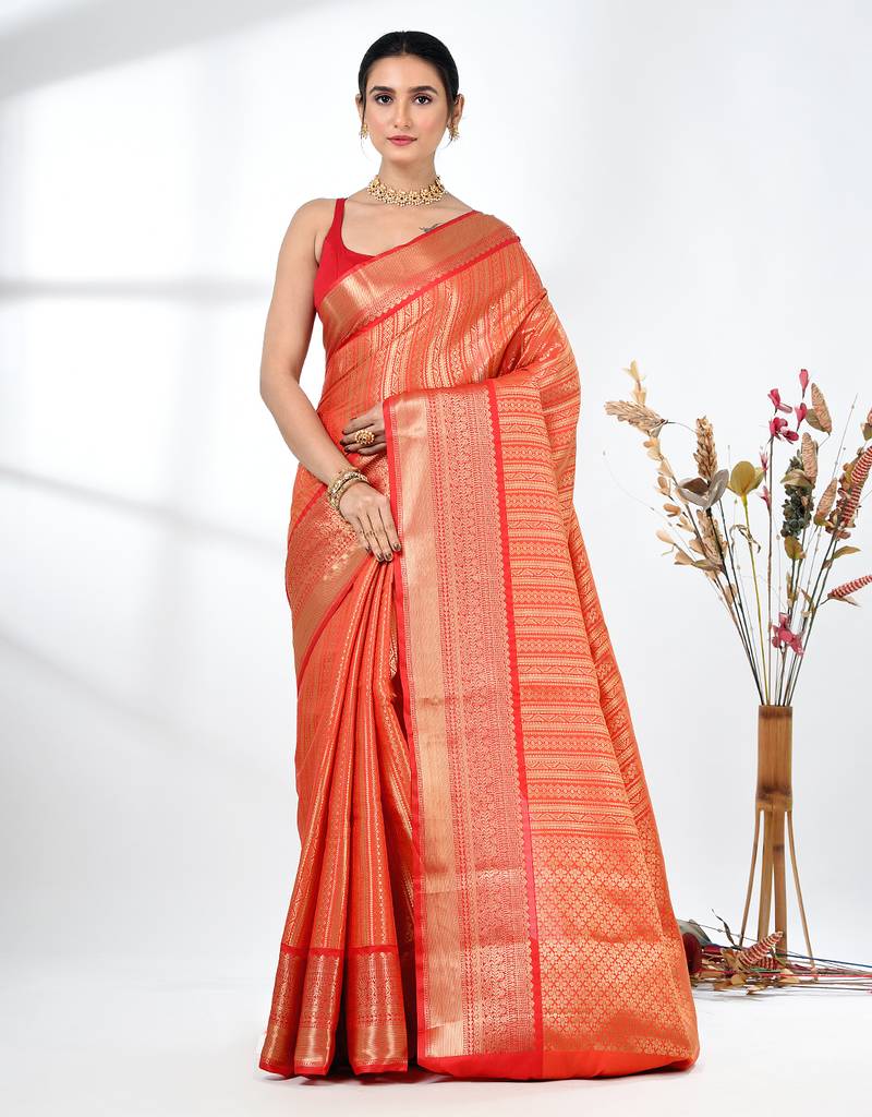 orange brocade saree with intricate borders