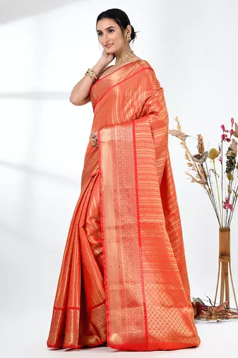 orange brocade saree with intricate borders