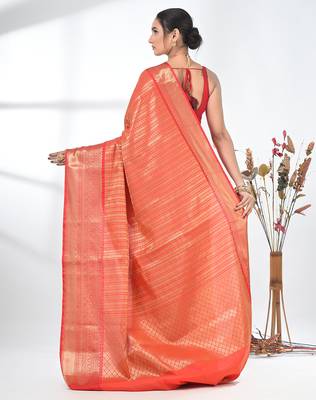 orange brocade saree with intricate borders 3