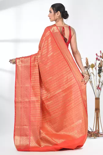 orange brocade saree with intricate borders
