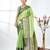 green brocade saree with intricate borders