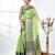 green brocade saree with intricate borders