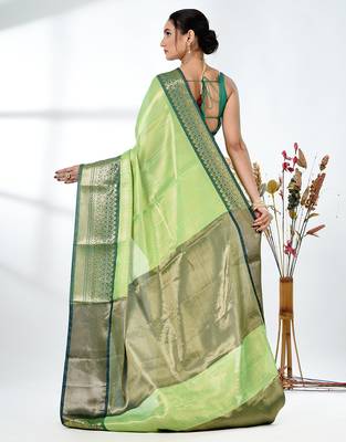 green brocade saree with intricate borders 3