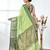 green brocade saree with intricate borders